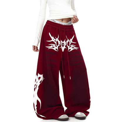 Distressed Vintage-style Totem-printed Harem Pants With A Curved Blade Design