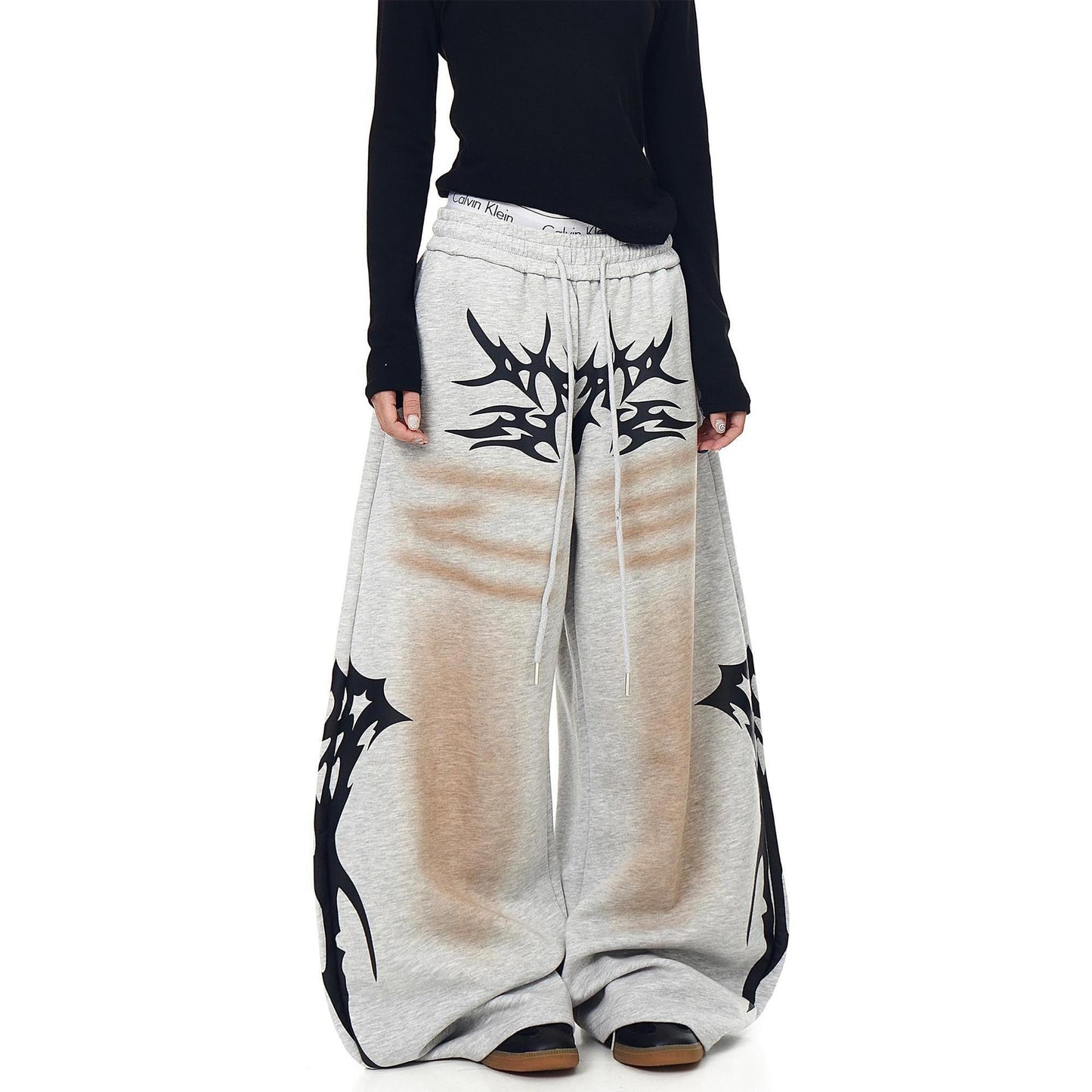 Distressed Vintage-style Totem-printed Harem Pants With A Curved Blade Design