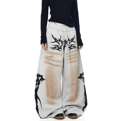 Distressed Vintage-style Totem-printed Harem Pants With A Curved Blade Design