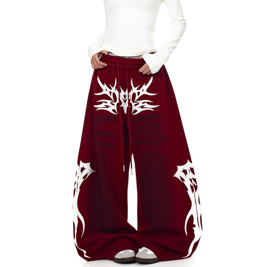 Distressed Vintage-style Totem-printed Harem Pants With A Curved Blade Design