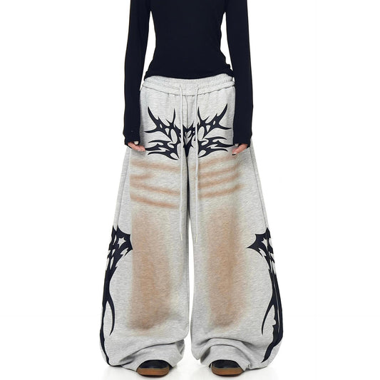 Distressed Vintage-style Totem-printed Harem Pants With A Curved Blade Design