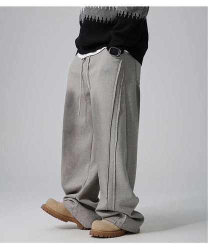 Fleece-Lined Distressed Knit Sweatpants With A Straight Leg In Winter Style